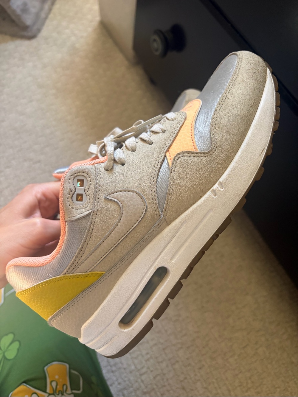 Nike Women's Light Gray Suede Sneakers with Peach & Yellow Accents